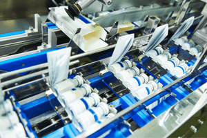 Pharma Secondary Packaging - vials on conveyor belt